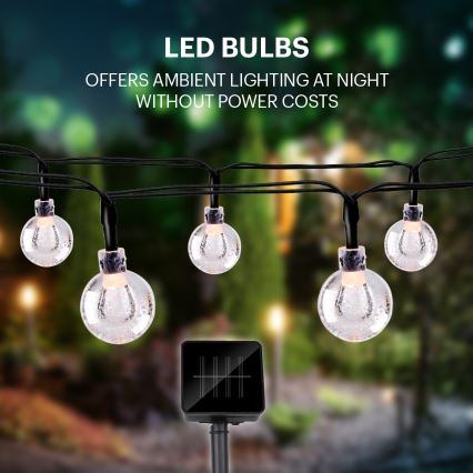 Grundig - LED solarna girlanda, 50 LED / 8 funkcija, 6,9 m, toplo belo svetlo, 600 mAh