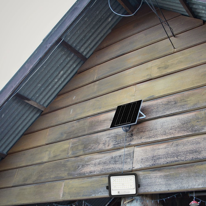 LED prigušiva solarni reflektor LED/100W/3,2V 2000-8000K IP65 5000 mAh crna + daljinski upravljač