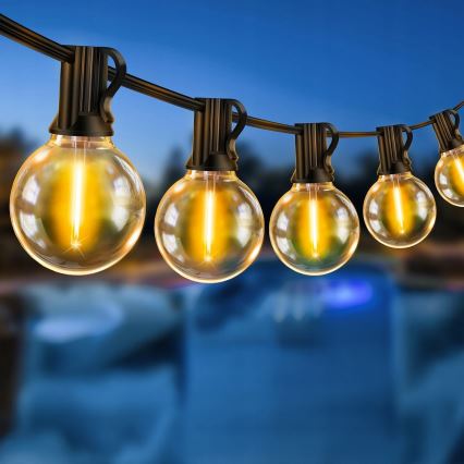 LED prigušiva spoljna dekorativna girlanda 25xE12/1W/24/230V 17,5 m IP65 crna + daljinski upravljač