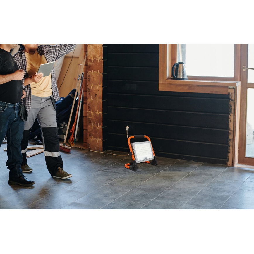 LED reflektor sa stativom LED/100W/230V 4500K IP65 narandžaste boje