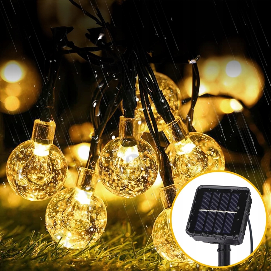 LED solarni dekorativni lanac 50xLED/8 funkcija 500 mAh 9,5 m IP67 topla bela