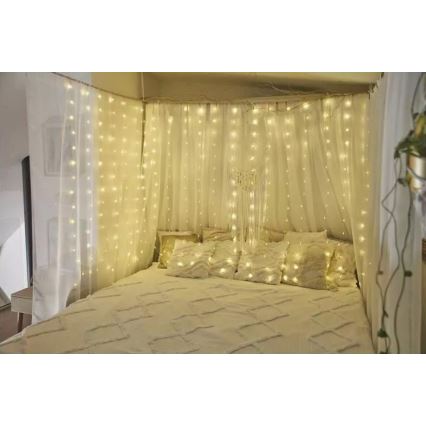 LED spoljni svetleći lanac 300xLED/8 funkcija, 5,9 m, IP44, topla bela