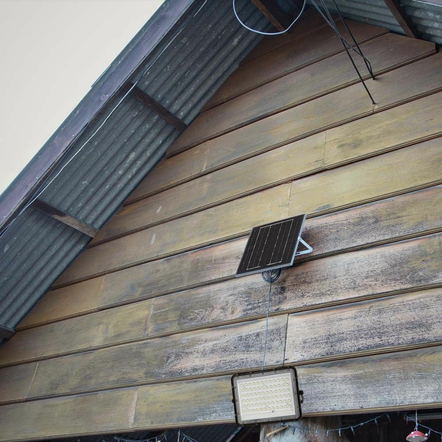 LED spoljni prigušiva solarni reflektor LED/15W/3,2V IP65 6400K 12000 mAh crna + daljinski upravljač